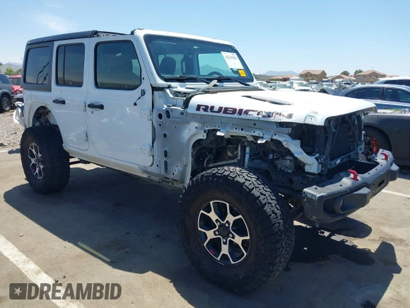 2021 Jeep Wrangler Unlimited Rubicon with VIN 1C4HJXFGXMW850556, listed as a IAAI auction lot 42234282 with 80,834 mi miles and . Bid and sale history available at DreamBid. Image 1.