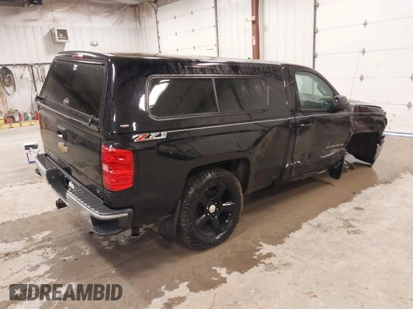 2015 Chevrolet Silverado 1500 LT with VIN 1GCNKREC7FZ176054, listed as a IAAI auction lot 41940955 with 197,857 mi miles and . Bid and sale history available at DreamBid. Image 4.