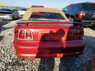 1998 Ford Mustang GT with VIN 1FAFP45X1WF248935, listed as a Copart auction lot 85225824 with 115,184 mi miles and Salvage Title. Bid and sale history available at carsss.com. Image 6.