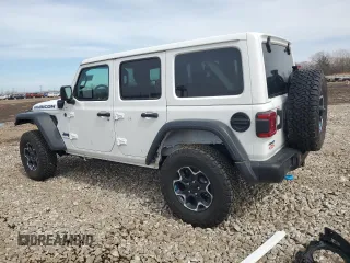 2023 Jeep Wrangler Rubicon z VIN 1C4JJXR6XPW663181, wystawiony jako Copart lot #49799125 z przebiegiem 8 085 mil mil oraz Szkoda całkowita • Salvage title. Historia ofert i sprzedaży dostępna na DreamBid. Obrazek 2.