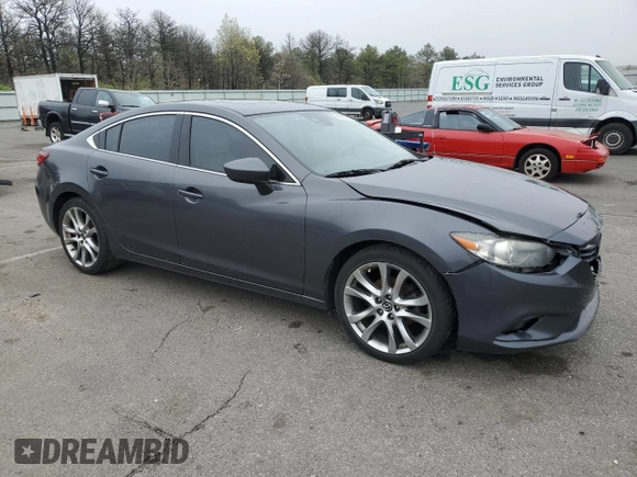 2014 Mazda 6 i Grand Touring with VIN JM1GJ1W61E1132313, listed as a Copart auction lot 54898745 with 117,905 mi miles and Salvage Title. Bid and sale history available at DreamBid. Image 4.