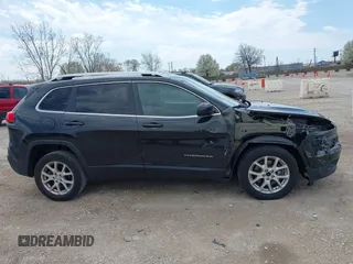 2014 Jeep Cherokee Latitude with VIN 1C4PJLCB6EW186576, listed as a IAAI auction lot 42099422 with 117,681 mi miles and . Bid and sale history available at DreamBid. Image 14.