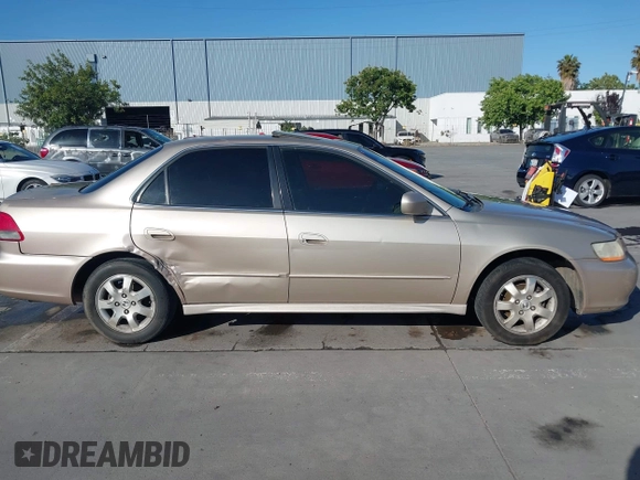 2001 Honda Accord EX z VIN JHMCG66801C010759, wystawiony jako IAAI lot #42303890 z przebiegiem 216 143 mil mil oraz . Historia ofert i sprzedaży dostępna na DreamBid. Obrazek 13.