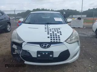 2013 Hyundai Veloster w/Gray Int z VIN KMHTC6AD3DU131703, wystawiony jako IAAI lot #42468831 z przebiegiem 188 513 mil mil oraz . Historia ofert i sprzedaży dostępna na DreamBid. Obrazek 13.