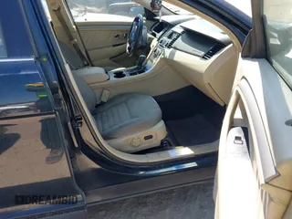 2014 Ford Taurus SE z VIN 1FAHP2D84EG162910, wystawiony jako IAAI lot #41779137 z przebiegiem Nie podano mil oraz . Historia ofert i sprzedaży dostępna na DreamBid. Obrazek 5.