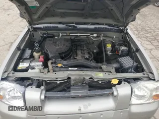2003 Nissan Frontier XE with VIN 1N6DD26T03C423079, listed as a Copart auction lot 44593295 with 232,850 mi miles and Salvage title. Bid and sale history available at DreamBid. Image 11.