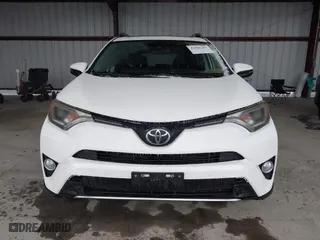 2018 Toyota RAV4 XLE with VIN JTMRFREV6JD222115, listed as a IAAI auction lot 41505367 with 118,126 mi miles. Bid and sale history available at carsss.com. Image 12.