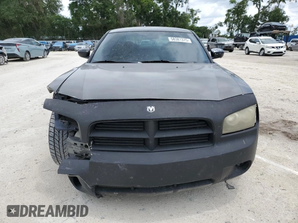 2009 Dodge Charger SE z VIN 2B3KA43DX9H530580, wystawiony jako Copart lot #58381375 z przebiegiem 300 292 mil mil oraz Szkoda całkowita • Salvage title. Historia ofert i sprzedaży dostępna na DreamBid. Obrazek 5.