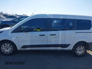 2015 Ford Transit Connect XL z VIN NM0GE9E74F1175703, wystawiony jako IAAI lot #42335351 z przebiegiem 416 622 mil mil oraz . Historia ofert i sprzedaży dostępna na DreamBid. Obrazek 14.
