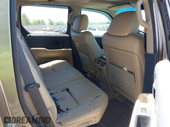 2011 Honda Ridgeline RTL with VIN 5FPYK1F57BB452321, listed as a IAAI auction lot 42306915 with Not provided miles and . Bid and sale history available at DreamBid. Image 8.