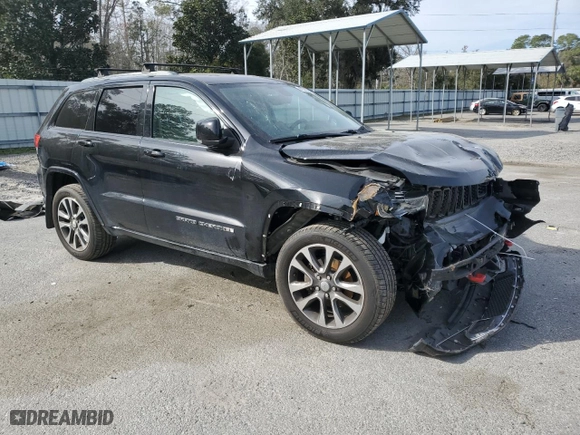 2017 Jeep Grand Cherokee Overland with VIN 1C4RJECG3HC723653, listed as a Copart auction lot 47365725 with 63,827 mi miles and Salvage Title. Bid and sale history available at carsss.com. Image 4.