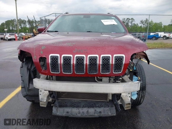 2019 Jeep Cherokee Latitude Plus with VIN 1C4PJMLB2KD104856, listed as a IAAI auction lot 42097709 with 89,552 mi miles and . Bid and sale history available at DreamBid. Image 13.