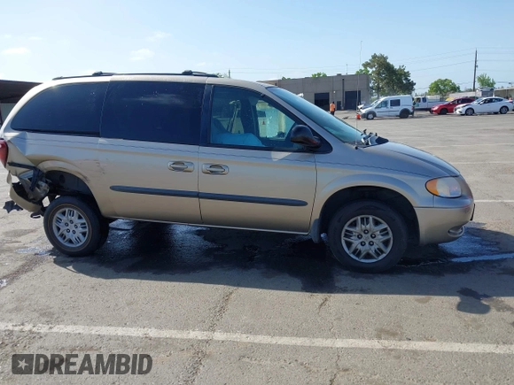 2003 Dodge Caravan Sport with VIN 2D4GP44R73R279132, listed as a IAAI auction lot 42100140 with 218,201 mi miles and . Bid and sale history available at carsss.com. Image 13.