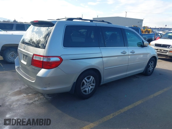 2005 Honda Odyssey EX-L with VIN 5FNRL38615B062427, listed as a IAAI auction lot 41922322 with 194,837 mi miles. Bid and sale history available at carsss.com. Image 4.