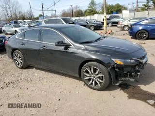 2023 Chevrolet Malibu RS with VIN 1G1ZG5ST0PF128245, listed as a Copart auction lot 48771525 with 51,676 mi miles and Salvage Title. Bid and sale history available at DreamBid. Image 4.