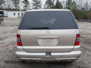 2003 Mercedes-Benz M-Class 3.2L with VIN 4JGAB54E43A383811, listed as a IAAI auction lot 41204136 with 209,327 mi miles. Bid and sale history available at carsss.com. Image 16.