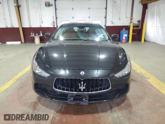 2015 Maserati Ghibli z VIN ZAM57XSA9F1139087, wystawiony jako Copart lot #52235355 z przebiegiem 68 788 mil mil oraz Szkoda całkowita • Salvage title. Historia ofert i sprzedaży dostępna na DreamBid. Obrazek 5.