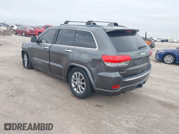 2015 Jeep Grand Cherokee Overland with VIN 1C4RJFCT3FC131122, listed as a IAAI auction lot 41513892 with 125,765 mi miles. Bid and sale history available at carsss.com. Image 3.