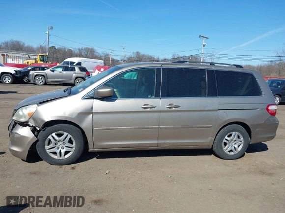 2006 Honda Odyssey EX-L z VIN 5FNRL38736B069969, wystawiony jako IAAI lot #41695311 z przebiegiem 196 218 mil mil oraz . Historia ofert i sprzedaży dostępna na DreamBid. Obrazek 14.