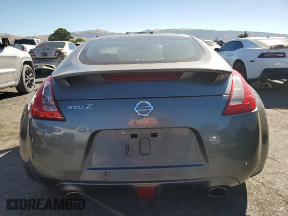 2013 Nissan 370Z with VIN JN1AZ4EH0DM380409, listed as a Copart auction lot 66869114 with 0 mi miles and Salvage Title. Bid and sale history available at carsss.com. Image 6.