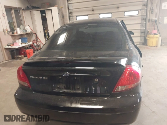 2004 Ford Taurus SE z VIN 1FAFP53U74G107504, wystawiony jako IAAI lot #42068692 z przebiegiem Nie podano mil oraz . Historia ofert i sprzedaży dostępna na DreamBid. Obrazek 16.