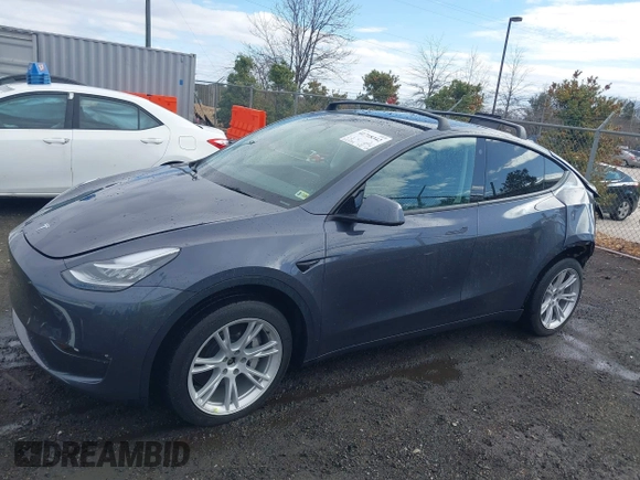 2023 Tesla Model Y Long Range with VIN 7SAYGDEE8PF599254, listed as a IAAI auction lot 41718342 with 24,339 mi miles and . Bid and sale history available at carsss.com. Image 15.