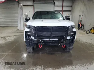 2021 Chevrolet Silverado 1500 LT Trail Boss with VIN 1GCPYFEL8MZ444404, listed as a Copart auction lot 47567215 with 10,384 mi miles and Salvage Title. Bid and sale history available at DreamBid. Image 5.
