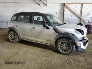 2016 MINI Countryman S with VIN WMWZC5C5XGWU03443, listed as a Copart auction lot 48915215 with 105,030 mi miles and Salvage Title. Bid and sale history available at DreamBid. Image 4.