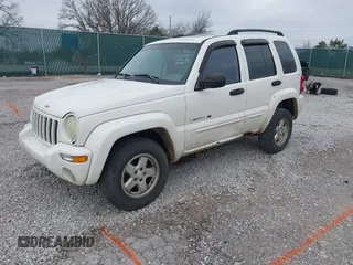 2002 Jeep Liberty Limited with VIN 1J4GL58K32W246480, listed as a IAAI auction lot 41832097 with 300,097 mi miles and . Bid and sale history available at carsss.com. Image 2.