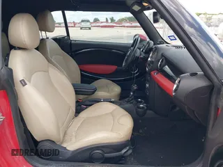 2014 MINI Convertible S z VIN WMWZP3C56ET707702, wystawiony jako IAAI lot #42431046 z przebiegiem 65 726 mil mil oraz . Historia ofert i sprzedaży dostępna na DreamBid. Obrazek 5.