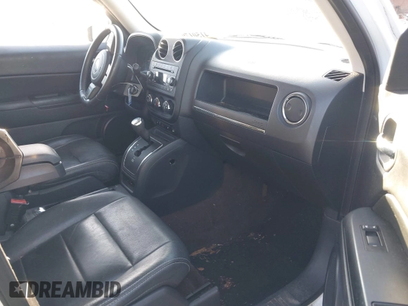 2015 Jeep Patriot High Altitude with VIN 1C4NJRFB1FD155335, listed as a IAAI auction lot 41501790 with 133,537 mi miles and . Bid and sale history available at carsss.com. Image 5.