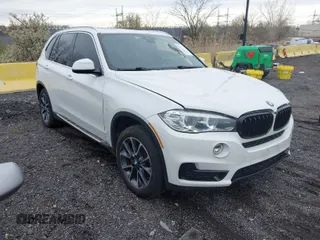 2018 BMW X5 xDrive35i with VIN 5UXKR0C58J0Y05234, listed as a IAAI auction lot 41957904 with 125,658 mi miles. Bid and sale history available at carsss.com. Image 1.