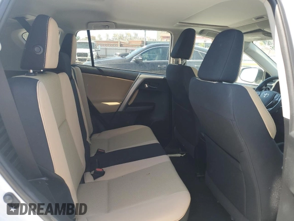 2018 Toyota RAV4 XLE with VIN 2T3WFREV7JW512949, listed as a Copart auction lot 52546345 with 41,558 mi miles and Salvage Title. Bid and sale history available at DreamBid. Image 11.