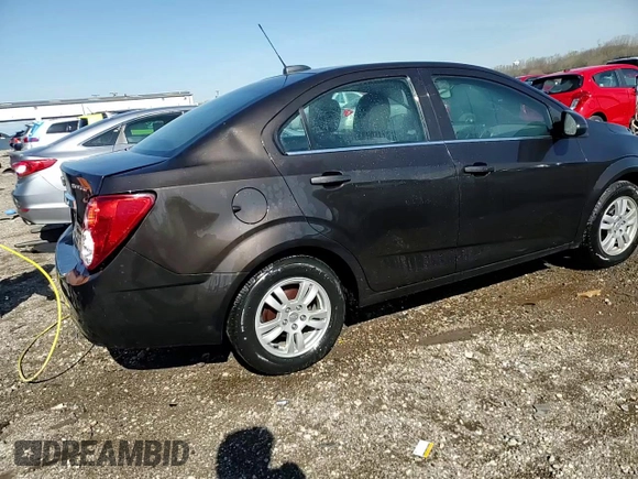 2015 Chevrolet Sonic LT z VIN 1G1JC5SH2F4200996, wystawiony jako Copart lot #53979965 z przebiegiem 129 200 mil mil oraz Szkoda całkowita • Salvage title. Historia ofert i sprzedaży dostępna na DreamBid. Obrazek 13.