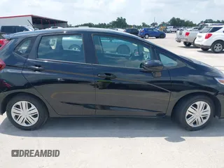 2020 Honda Fit LX z VIN 3HGGK5H45LM733449, wystawiony jako IAAI lot #42388666 z przebiegiem 28 064 mil mil oraz . Historia ofert i sprzedaży dostępna na DreamBid. Obrazek 13.