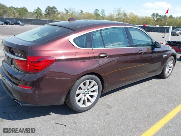 2011 BMW 5 Series Gran Turismo 550i xDrive with VIN WBASP4C53BC341636, listed as a IAAI auction lot 41883438 with 203,526 mi miles. Bid and sale history available at carsss.com. Image 4.