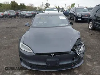 2021 Tesla Model S Long Range with VIN 5YJSA1E5XMF428519, listed as a IAAI auction lot 41926242 with 54,284 mi miles and . Bid and sale history available at DreamBid. Image 12.