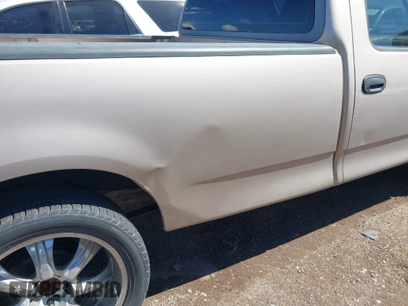 1998 Ford F-150 with VIN 1FTZF1726WKB44118, listed as a IAAI auction lot 41786536 with 155,032 mi miles and . Bid and sale history available at DreamBid. Image 6.