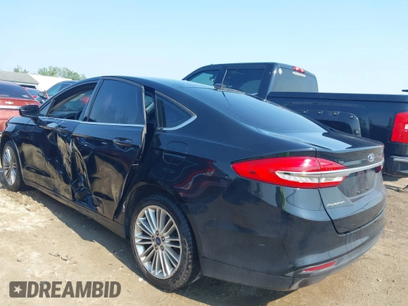 2017 Ford Fusion SE z VIN 3FA6P0H71HR135111, wystawiony jako IAAI lot #42454080 z przebiegiem 120 355 mil mil oraz . Historia ofert i sprzedaży dostępna na DreamBid. Obrazek 3.
