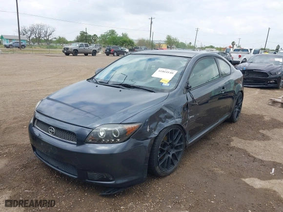 2007 Scion tC Spec with VIN JTKDE177X70160319, listed as a IAAI auction lot 41864140 with 200,184 mi miles. Bid and sale history available at carsss.com. Image 6.