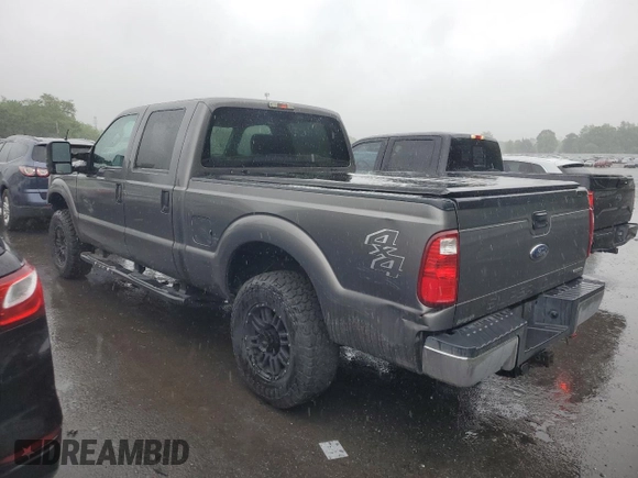 2014 Ford F-250 XL with VIN 1FT7W2B60EEA33908, listed as a Copart auction lot 54752765 with 215,428 mi miles and Salvage title. Bid and sale history available at DreamBid. Image 2.