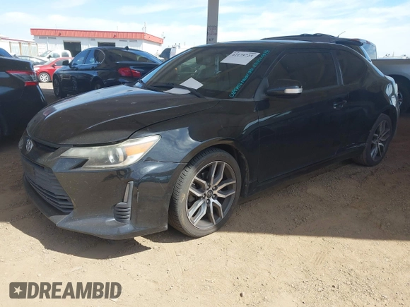 2014 Scion tC z VIN JTKJF5C75E3069757, wystawiony jako IAAI lot #42175725 z przebiegiem 191 054 mil mil oraz . Historia ofert i sprzedaży dostępna na DreamBid. Obrazek 16.