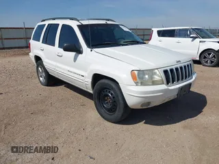 2002 Jeep Grand Cherokee Limited with VIN 1J4GW58NX2C133709, listed as a IAAI auction lot 42398637 with 226,149 mi miles and . Bid and sale history available at DreamBid. Image 1.