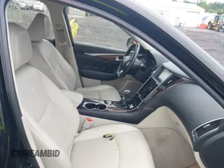 2014 Infiniti Q50 Premium z VIN JN1BV7AR3EM697330, wystawiony jako IAAI lot #42536087 z przebiegiem 231 222 mil mil oraz . Historia ofert i sprzedaży dostępna na DreamBid. Obrazek 5.