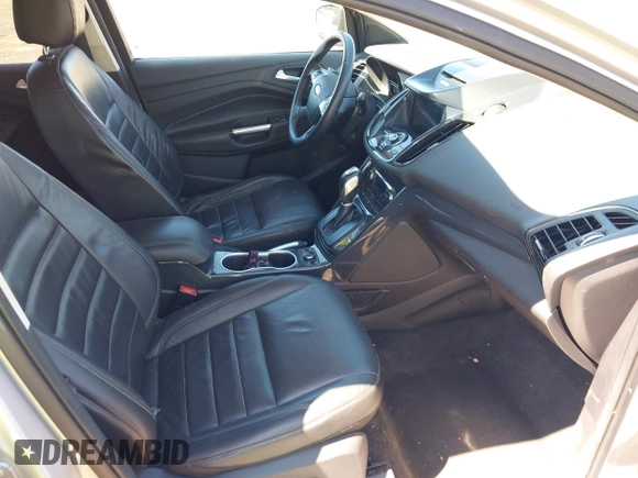 2016 Ford Escape Titanium with VIN 1FMCU9JX6GUB80715, listed as a IAAI auction lot 42060305 with 132,951 mi miles and . Bid and sale history available at DreamBid. Image 5.