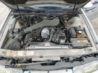 1995 Ford Thunderbird LX z VIN 1FALP62W7SH169522, wystawiony jako Copart lot #58637765 z przebiegiem 136 505 mil mil oraz Czysty tytuł • Clean title. Historia ofert i sprzedaży dostępna na DreamBid. Obrazek 11.