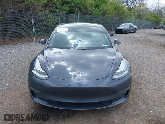 2020 Tesla Model 3 Long Range with VIN 5YJ3E1EB2LF646449, listed as a IAAI auction lot 42059086 with 120,981 mi miles and . Bid and sale history available at DreamBid. Image 13.