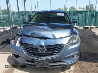 2014 Mazda CX-9 Touring with VIN JM3TB3CV7E0440747, listed as a IAAI auction lot 42457709 with 166,588 mi miles and . Bid and sale history available at DreamBid. Image 12.
