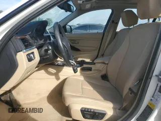 2014 BMW 3 Series 320i xDrive with VIN WBA3C3G52ENS67719, listed as a Copart auction lot 56863505 with 90,490 mi miles and Salvage title. Bid and sale history available at DreamBid. Image 7.