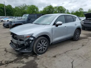 2018 Mazda CX-5 Grand Touring с VIN JM3KFBDMXJ0409793, выставлен на аукционе Copart как лот 58874315 с пробегом 145 271 миль миль и Списание • Salvage title. История ставок и продаж доступна на DreamBid. Изображение 1.